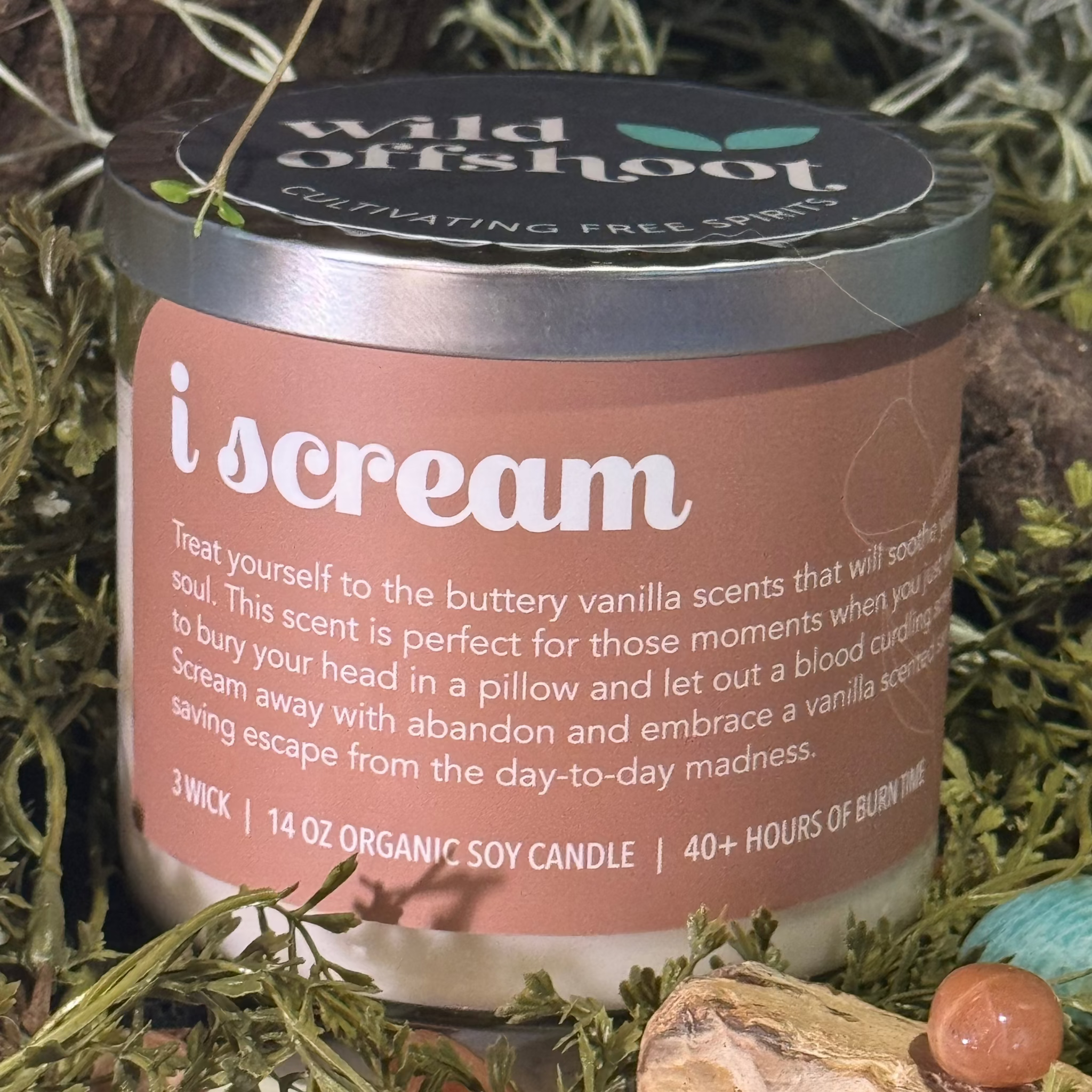 A brown candle 14 oz soy candle labeled 'I Scream' with white text, three wicks and 40 hours of burn time.