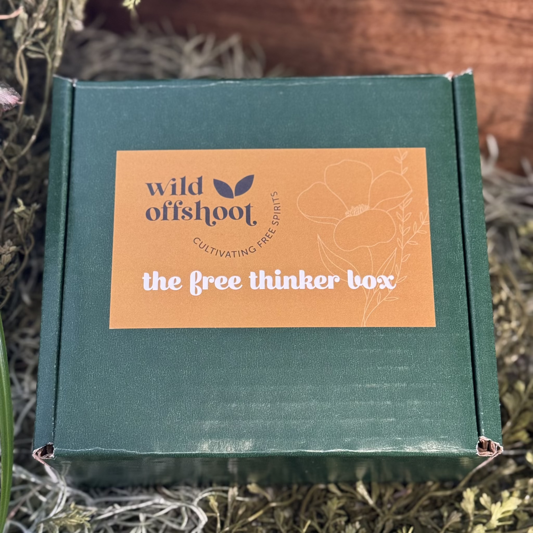 A green box labeled 'Wild Offshoot" 'The Free Thinker Box' written on it.